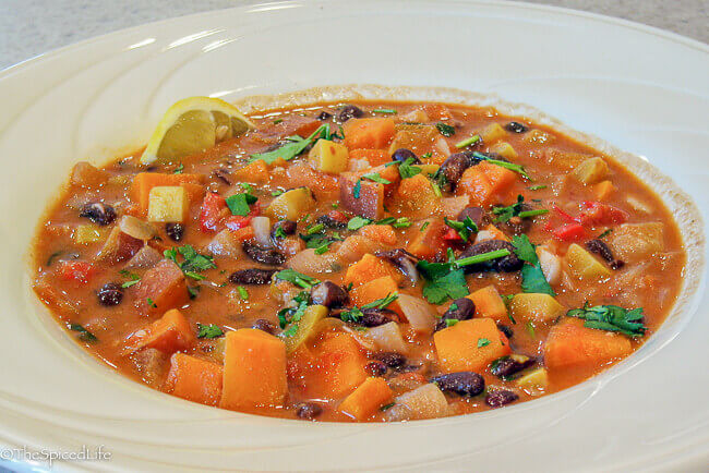 This Sweet Potato and Peanut Soup with Black Beans will rock your world! Easy, delicious, healthy!