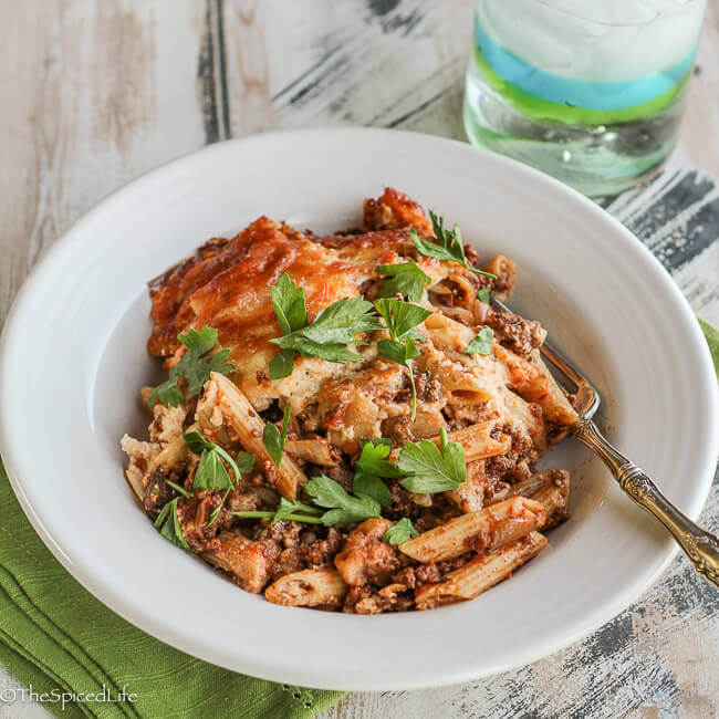 Pastitsio: Greek comfort food casserole of pasta, ground beef and bechamel--lightened with cauliflower and mushrooms!