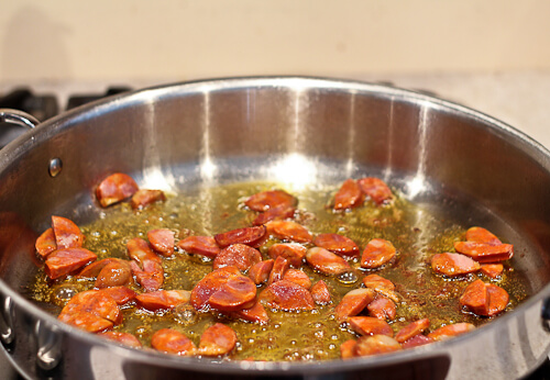 chorizo browning in olive oil