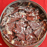 Cocoa cookie drizzled with bittersweet and white chocolates and topped with crushed candy canes