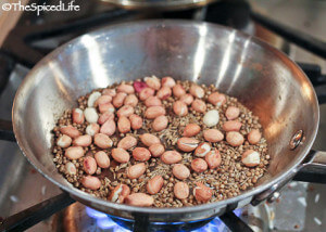 toasting peanuts, coriander and cumin seeds for spice blend