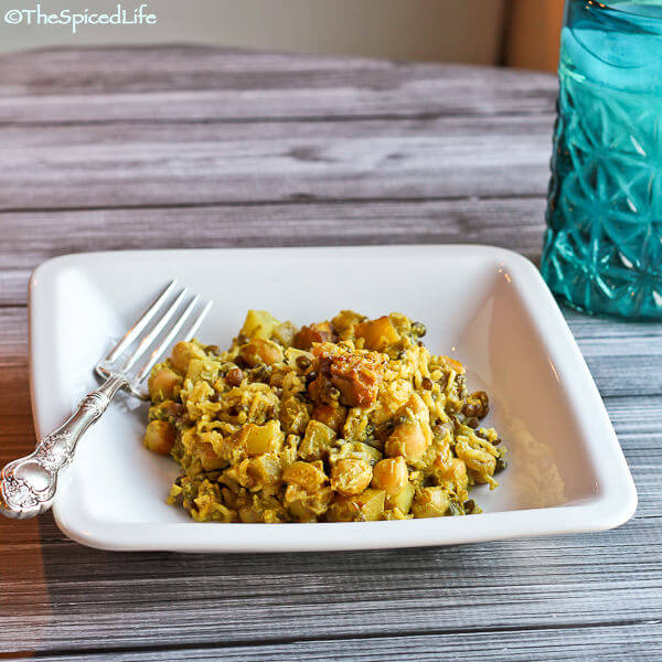 Casserole of Curried Chickpeas and lentils with Green Mango