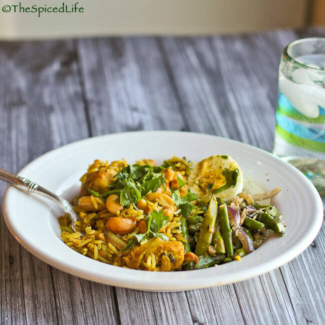 Fabulously easy and delicious Indian #GlutenFree meal! Slow cooked chicken is used to make an outstanding pilaf served with a stir fried Asparagus with Ginger