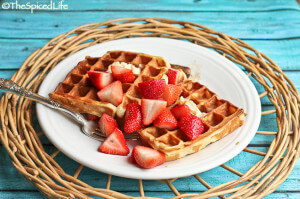 Ricotta-Yogurt Waffles Topped with Strawberries Lightly Macerated in Sugar