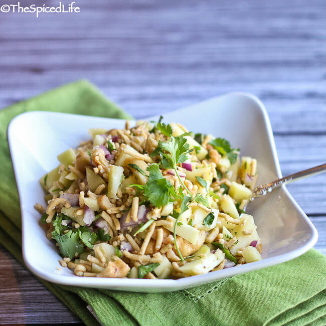 Green Mango Chaat -- a crispy, tart, refreshing snack salad from India with cashews, green mango and sev (fried chickpea noodles)