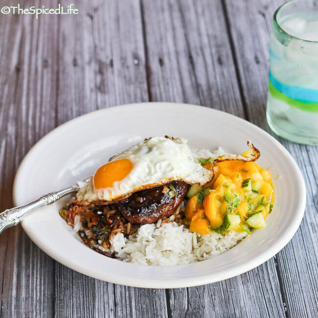 Loco Moco, a Hawaiian specialty with rice, hamburger, gravy, and a fried egg--served with a Mango Cucumber Relish
