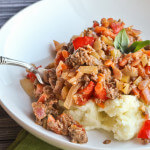 Ground Beef flavored with Dijon Mustard and tomatoes and Veggies on Smashed Potatoes