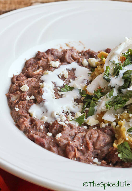 Traditional Refried Beans from SCRATCH served with Chilaquiles Verde