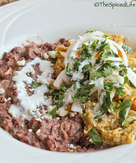 Traditional Refried Beans from SCRATCH served with Chilaquiles Verde