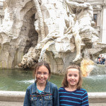 kids in front of Nile river god in fountain of the four rivers, Piazza Navona, Rome
