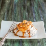 Bittersweet Chocolate Meringue Nests with Whipped Cream, Salted Caramel Sauce and Cocoa Nibs--the dessert is restaurant worthy and yet incredibly easy!