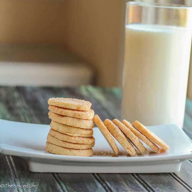 Cinnamon Dusted Orange Icebox Cookies: slice and bake cookies are easy to make ahead for the Holidays (or whenever); dip them in cinnamon and sugar before baking! The whole family loved these!