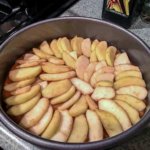 apples in bottom of pan for Upside Down Apple Cake